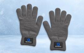Paire de gants gris en maille personnalisés avec un logo d'entreprise sur les poignets